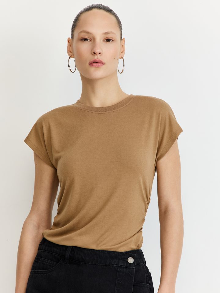 טי שירט כיווצים