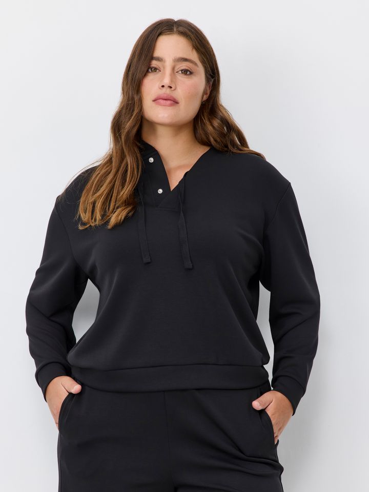 סווטשירט רך בשילוב תיקתקים