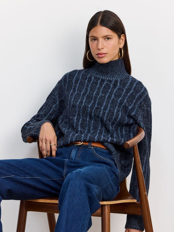 סוודר גולף צמות אקו