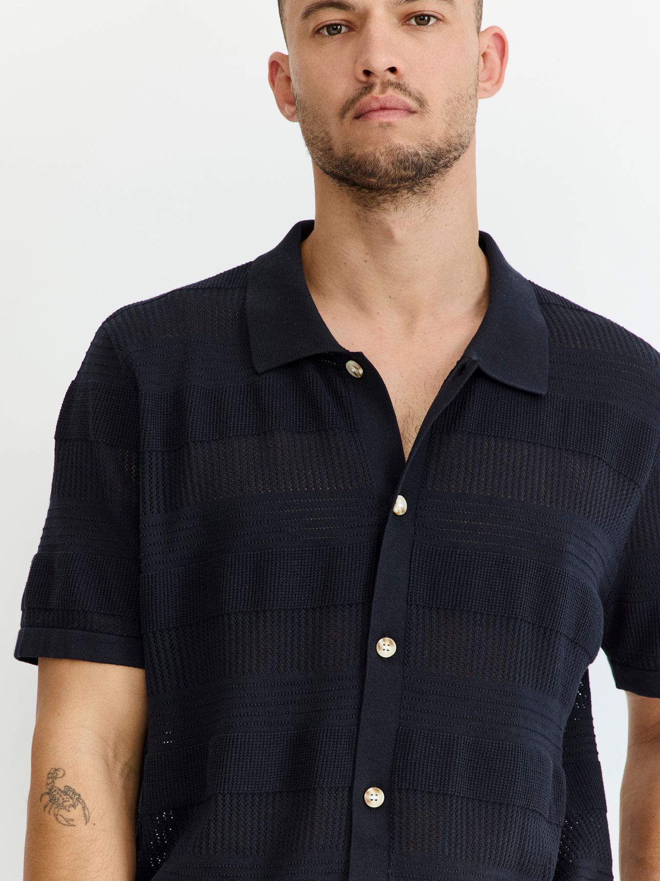 חולצת סריג מכופתרת