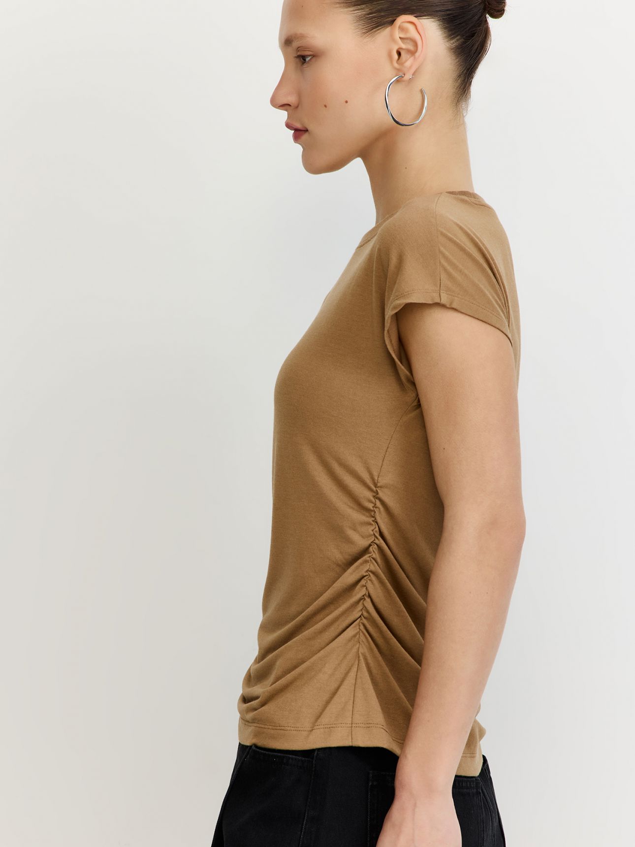 טי שירט כיווצים