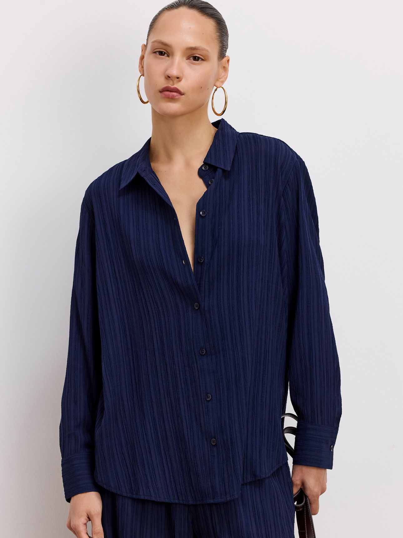 חולצה מכופתרת OVERSIZE